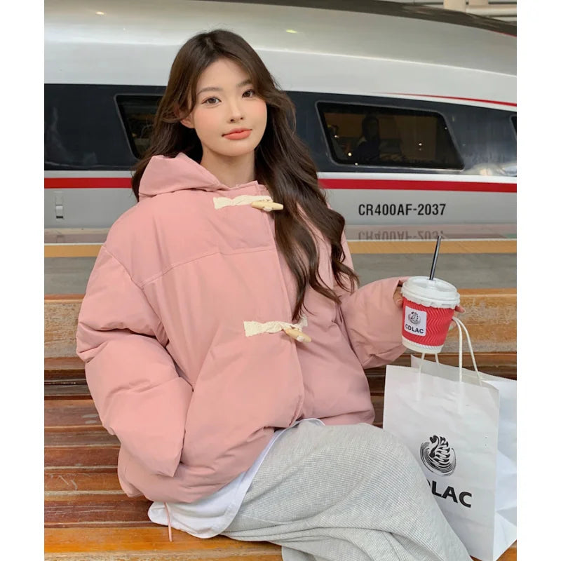 Parka rembourrée à capuche et fermeture originale