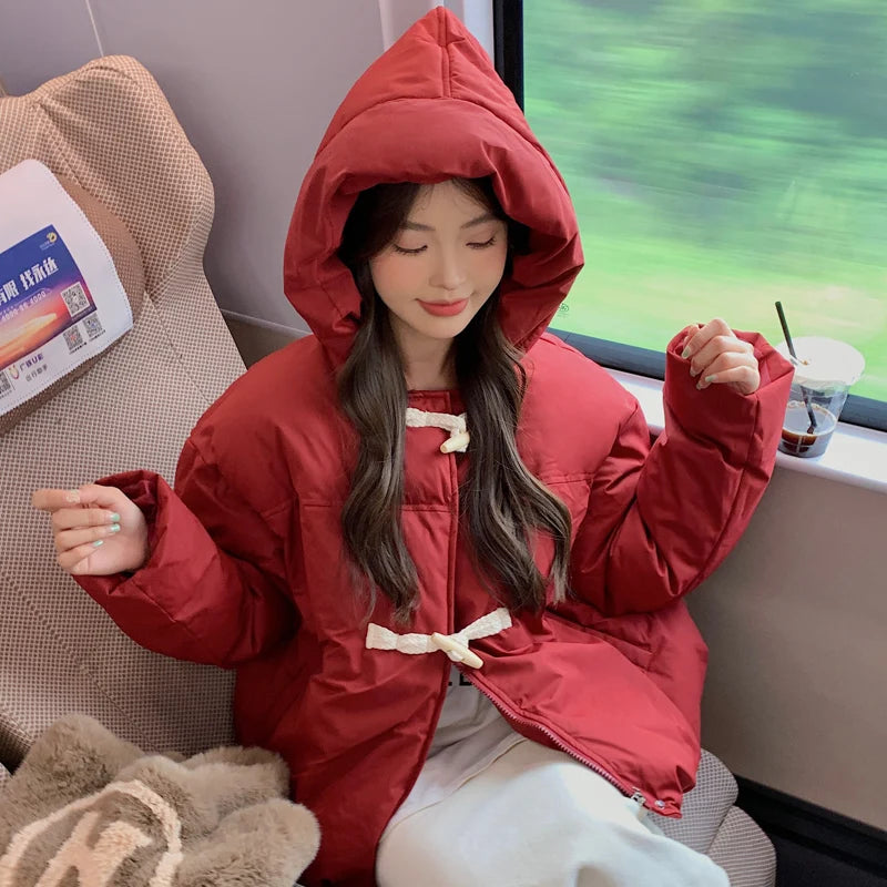 Parka rembourrée à capuche et fermeture originale